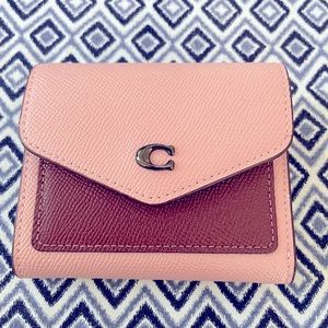COACH Pink Colorblock Trifold Leather Wallet. Cross-grain leather.